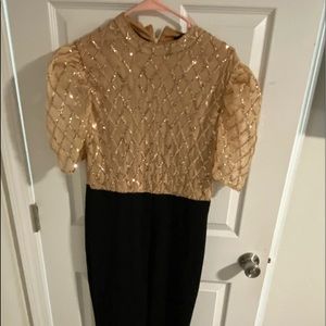 Brand new jumpsuit, black and gold. Size xl. Back zips up. SHEIN brand.